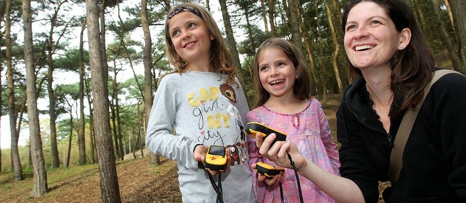 Mom and daughters geocaching