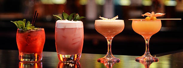 Craft Cocktail Assortment on Well Lit Bar